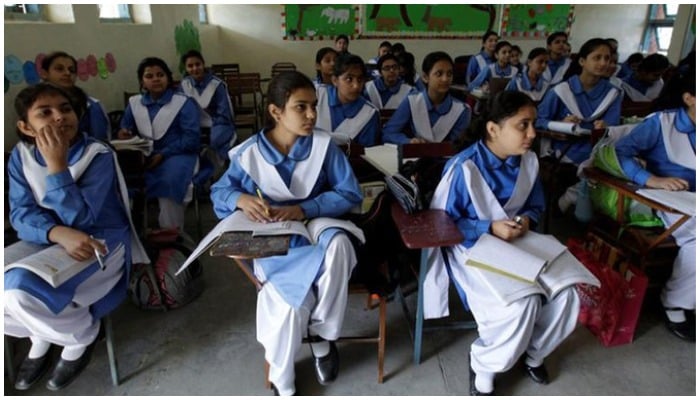 Students listen to their teacher during a lesson at the Islamabad College for girls in Islamabad, Pakistan. Photo: Reuters/ file