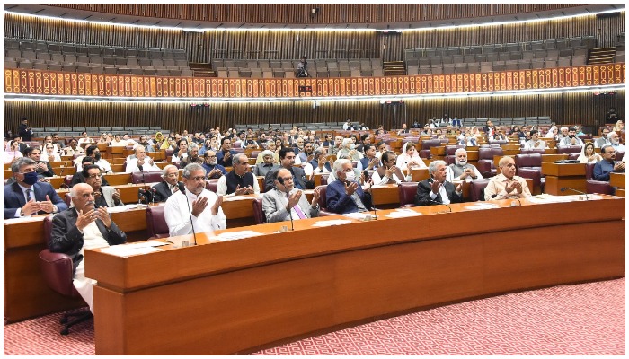 Opposition MNAs offering Fateha for deceased MNA in the NA session on March 25, 2022. Photo: Twitter/ @NAofPakistan