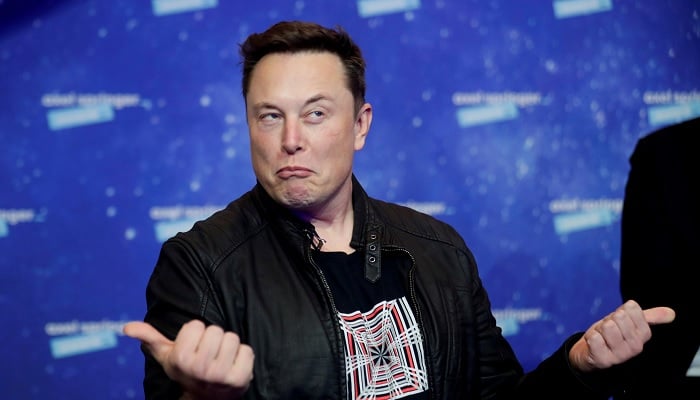 SpaceX owner and Tesla CEO Elon Musk grimaces after arriving on the red carpet for the Axel Springer award, in Berlin, Germany, December 1, 2020. —Reuters