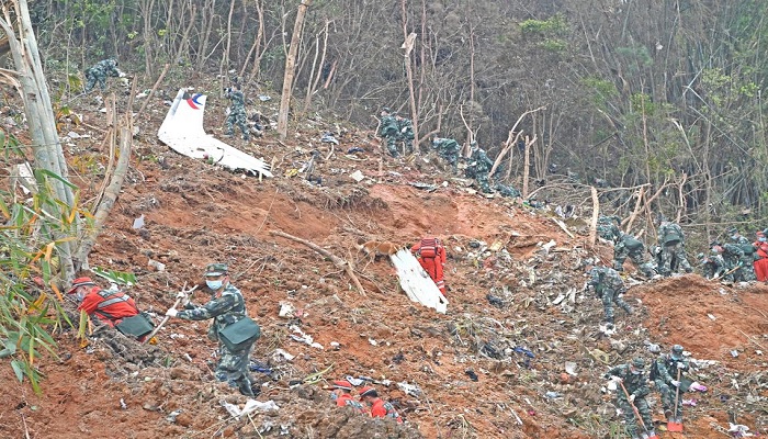 Rescuers search for the black boxes at a plane crash site in Tengxian county of Wuzhou, Guangxi Zhuang Autonomous Region, China March 22, 2022. A China Eastern Airlines passenger plane, flight MU5735, crashed into the mountainside on Monday. — Reuters