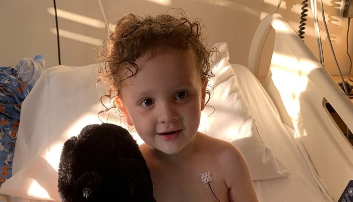 Adrian James, 2, sits up in a bed after spending more than a week on a ventilator in the intensive care unit at Cardinal Glennon Childrens Hospital in St. Louis for a severe case of COVID-19, in Missouri, U.S., October 11, 2021. — Reuters