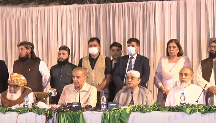 PML-N President Shahbaz Sharif (centre left) address a press conference alongside PDM chief Maulana Fazlur Rehman (left), PPP Co-chairman Asif Ali Zardari (centre right), and BAP Parliamentary Leader Khalid Magsi (right) in Islamabad, on March 28, 2022. — YouTube/HumNewsLive