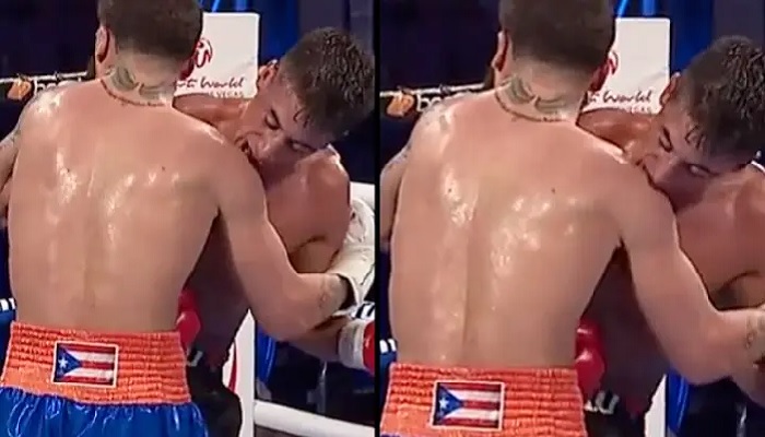 Screengrab from video. BoxerNicolas Pablo Demario can be seen biting his opponent Josue Vargas on the shoulder during a match. — Twitter/trboxing