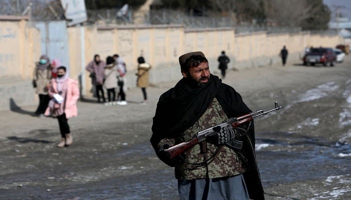 A Taliban fighter guards a street in Kabul, Afghanistan, December 16, 2021. —Reuters