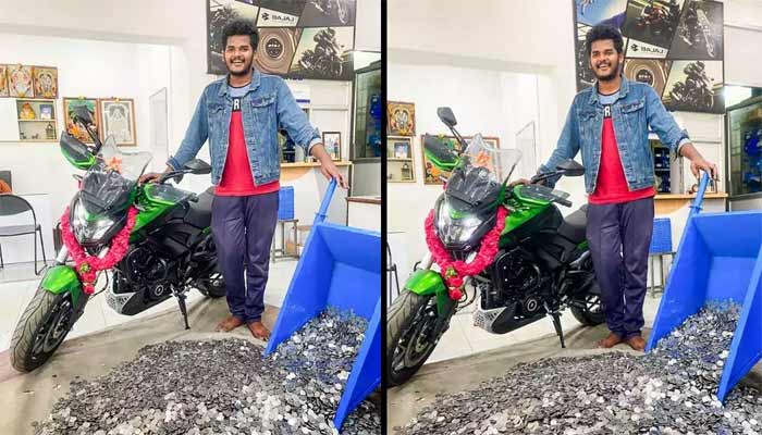 V Boopathi pays for his dream bike in coins.— Times of India