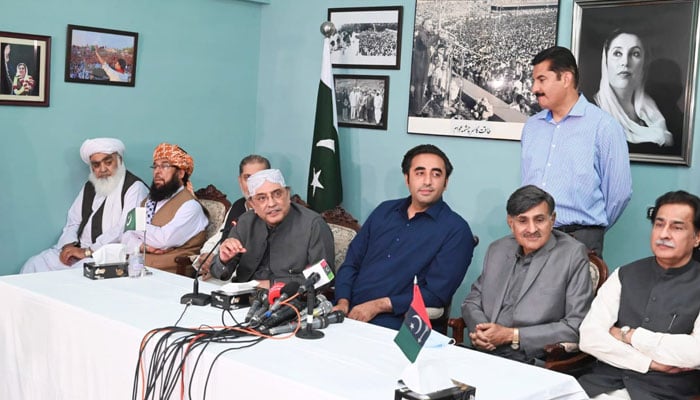 PPP Co-chairman Asif Ali Zardari (centre) speaks during a press conference along with other Opposition leaders in Islamabad, on March 29, 2022. — Twitter/@MediaCellPPP