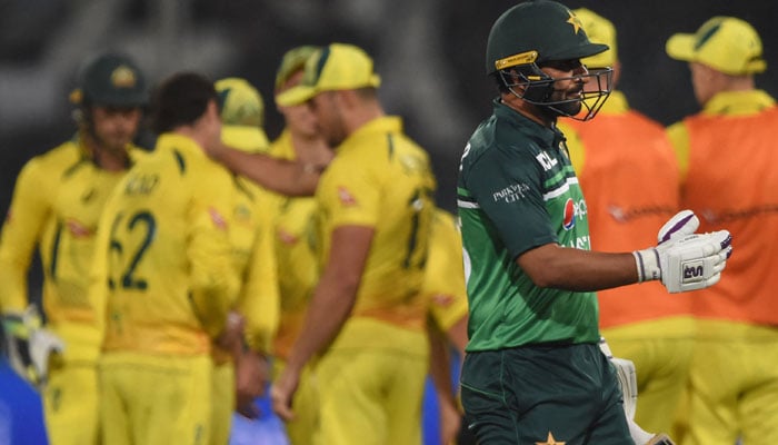 Iftikhar Ahmed walks back to pavilion after his dismissal during the first ODI between Pakistan and Australia at the Gaddafi Cricket Stadium in Lahore on March 29, 2022. — AFP