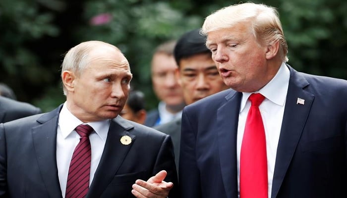 File Picture: U.S. President Donald Trump and Russias President Vladimir Putin talk during the family photo session at the APEC Summit in Danang, Vietnam November 11, 2017. — Reuters