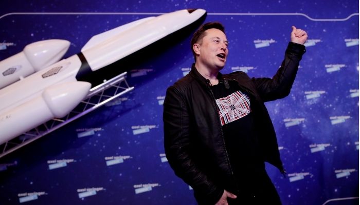 SpaceX owner and Tesla CEO Elon Musk gestures after arriving on the red carpet for the Axel Springer award, in Berlin, Germany, December 1, 2020. — Reuters