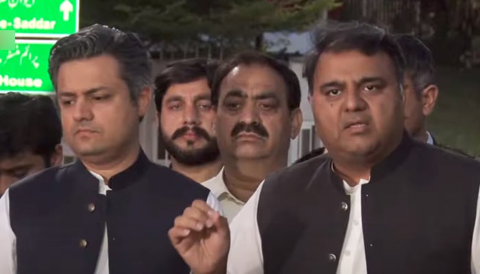 (Left to right) Minister for Energy Hammad Azhar and Minister for Information and Broadcasting Fawad Chaudhry addressing a press conference in Islamabad on April 1, 2022. — Screengrab via Hum News Live