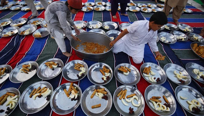 People arrange iftar for faithful to break their fast during the first day of the Holy month of Ramadan. — INP