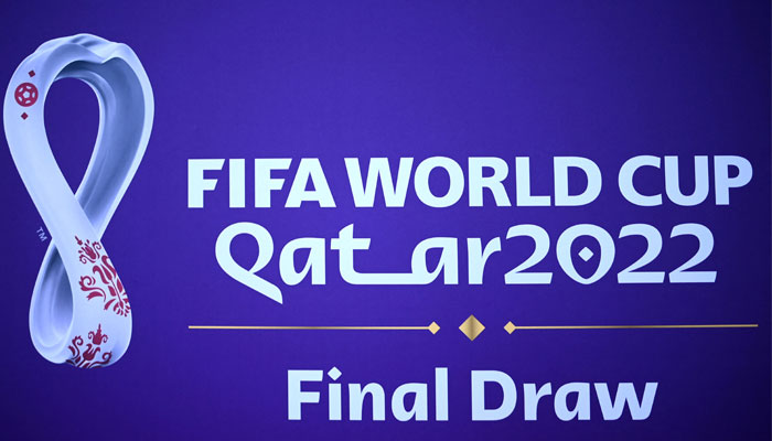 A view of the logo of the 2022 World Cup in Qatar ahead of the Final draw at the Doha Exhibition and Convention Center on April 1, 2022. — AFP
