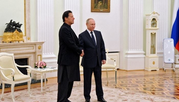 Russian President Vladimir Putin shakes hands with Pakistans Prime Minister Imran Khan during a meeting in Moscow, Russia February 24, 2022. — Reuters