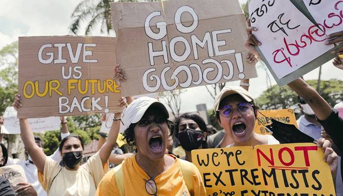 People shout slogans against Sri Lankas President Gotabaya Rajapaksa and demand that Rajapaksa family politicians step down, during a protest amid the countrys economic crisis, at Independence Square in Colombo, Sri Lanka, April 4, 2022. — Reuters