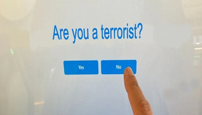 A self-check-in booth at US Airport asks are you a terrorist?. Twitter/AsaadHanna