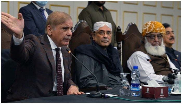 Pakistani Opposition Leader Shahbaz Sharif (L), speaks during a press conference next to PPP Co-chairperson Asif Ali Zardari and JUI-F chief Fazlur Rehman on March 8, 2022. — AFP/File