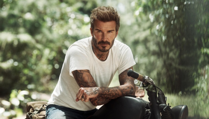 Pictures: David Beckham sports causal look on his lavish yacht in Miami