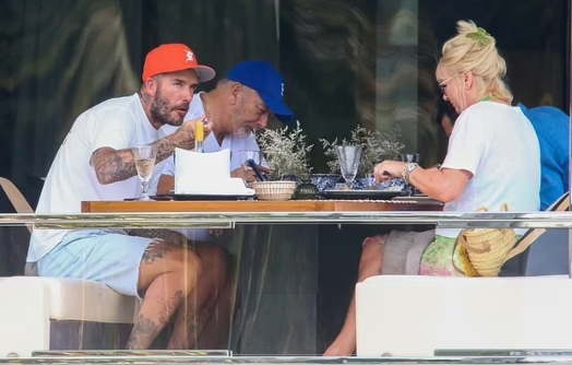 Pictures: David Beckham sports causal look on his lavish yacht in Miami
