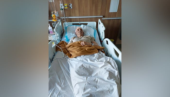 This handout photo received as a courtesy of Hoshedar Contractor on April 7, 2022, shows 88-year-old former Indian cricket team captain Nari Contractor laying on a hospital bed in Mumbai. — AFP