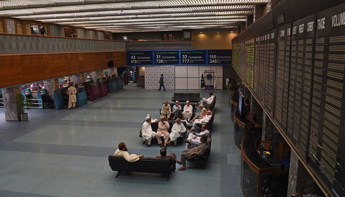 Investors sitting in the main lounge of the Pakistan Stock Exchange. — AFP/File