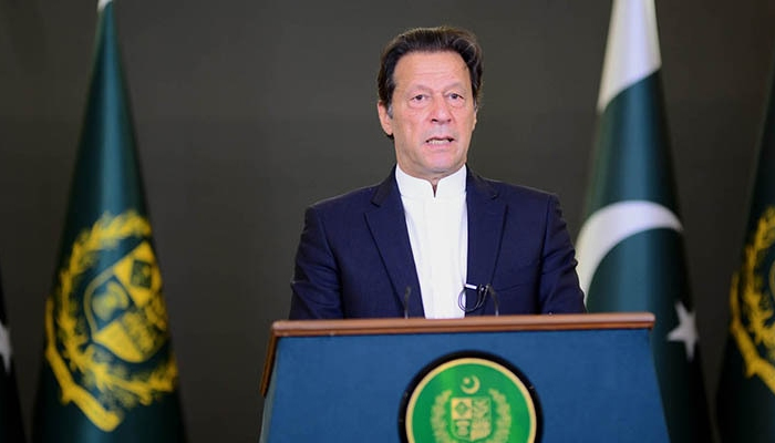 Prime Minister Imran Khan delivers a televised address in this undated photo. — PID/File