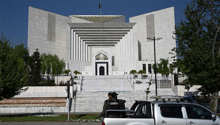 Rangers patrol along a street past Pakistan´s Supreme Court in Islamabad on April 5, 2022. Photo— AFP