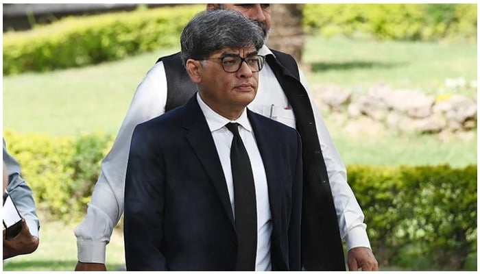 Former Attorney-General for Pakistan, Khalid Jawed Khan arrives to attend a hearing outside the Supreme Court building in Islamabad on April 7, 2022. — AFP