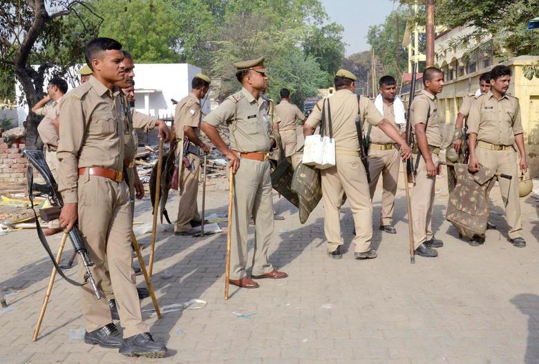 Policemen stand outside a park, a day after clashes between police and squatters, in Mathura, India June 3, 2016. — Reuters/file