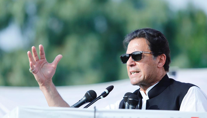 PTI chairman Imran Khan addressing a crowd at a public rally. — Twitter/Imran Khan