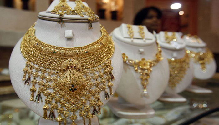 Gold extends slide on rupee appreciation political stability