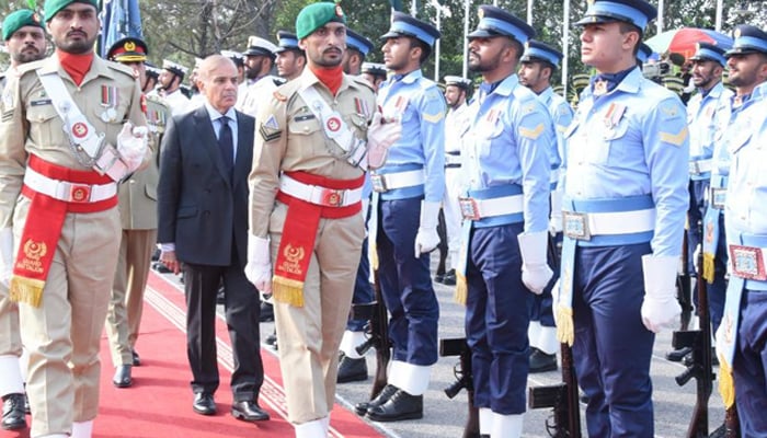 Prime Minister Muhammad Shehbaz Sharif receives guard of honour at PM House on April 12, 2022. — Twitter/@pmln_org