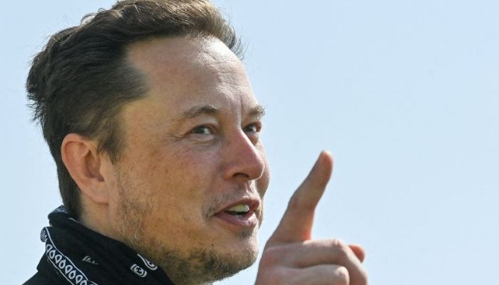 Tesla CEO Elon Musk gestures as he visits the construction site of Teslas Gigafactory in Gruenheide near Berlin, Germany, August 13, 2021. Reuters