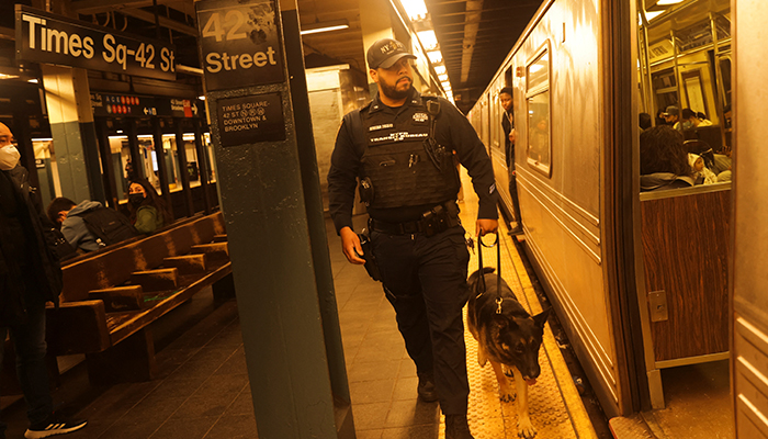 A police officer checks Manhattan subways after a shooting at a subway station in the Brooklyn borough of New York City, New York, US, on April 12, 2022. — Reuters