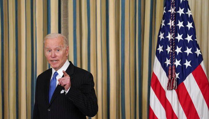 U.S. President Joe Biden answers a question after signing into law H.R. 3076, the Postal Service Reform Act of 2022 at the White House in Washington, US, April 6, 2022. Photo— REUTERS/Kevin Lamarque