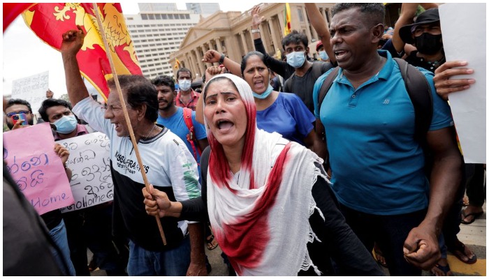 People shout slogans during a protests against Sri Lanka President Gotabaya Rajapaksa in front of the Presidential Secretariat building, amid the countrys economic crisis, in Colombo, Sri Lanka, April 12, 2022. — Reuters