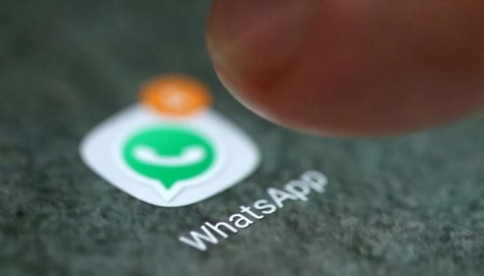 The WhatsApp app logo is seen on a smartphone in this picture illustration taken September 15, 2017. Reuters