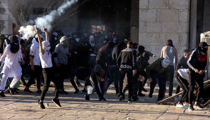 Israeli security forces clash with Palestinian protestors at the compound that houses Al-Aqsa Mosque, known to Muslims as Noble Sanctuary and to Jews as Temple Mount, in Jerusalems Old City on April 15, 2022. — Reuters/File