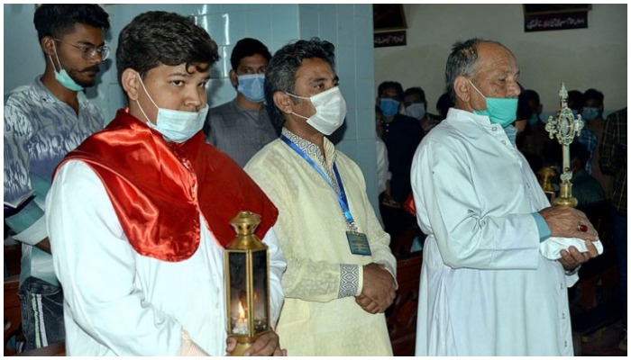 Christians busy in their religious rituals at St Francis Church, Anarkali to mark Good Friday in Lahore on April 2, 2021. — APP