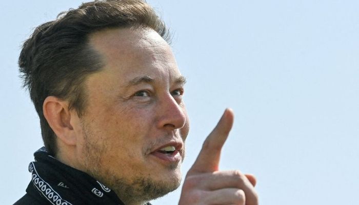 Tesla CEO Elon Musk gestures as he visits the construction site of Teslas Gigafactory in Gruenheide near Berlin, Germany, August 13, 2021. Reuters