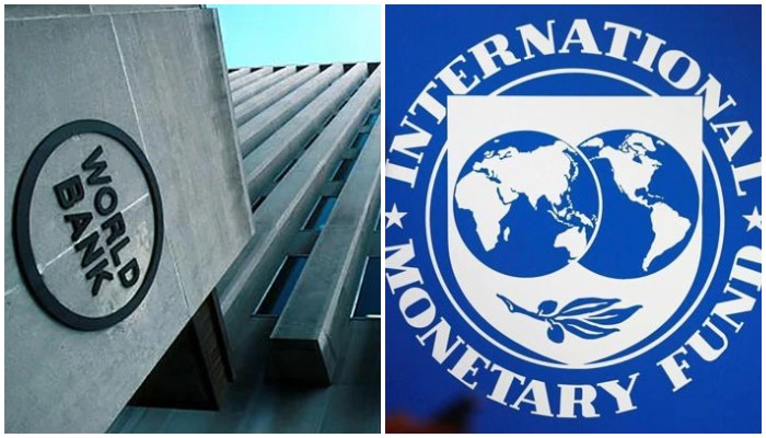 World Bank building in Washington DC and logo of the IMF. — Reuters/ file
