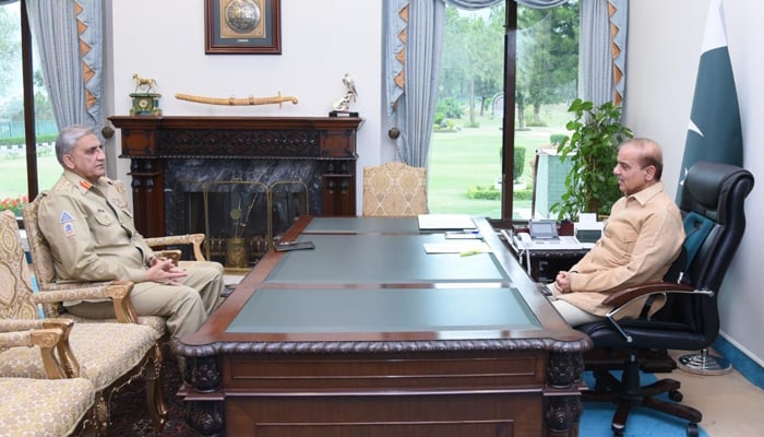 Chief of Army Staff General Qamar Javed Bajwa (left) calls on Prime Minister Shehbaz Sharif at the Prime Ministers Office in Islamabad, on April 19, 2022. — PakPMO