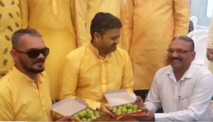 Groom in Gujarat receives a box of lemons as a gift. — Screengrab/Twitter