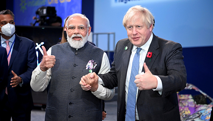 Britains Prime Minister Boris Johnson and Indias Prime Minister Narendra Modi attend the Accelerating Clean Technology Innovation and Deployment session at the UN Climate Change Conference (COP26) in Glasgow, Scotland, Britain November 2, 2021. — Reuters