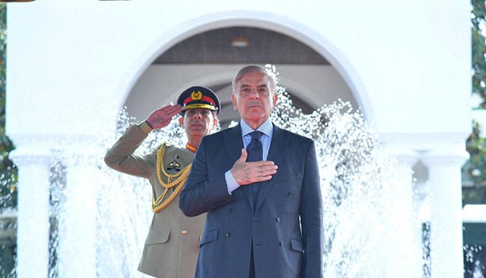 Prime Minister Shehbaz Sharif gestures during the guard of honour ceremony at the Prime Ministers House in Islamabad, Pakistan April 12, 2022. — Reuters