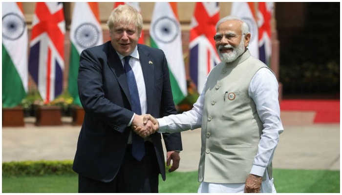 British Prime Minister Boris Johnson and Indian Prime Minister Narendra Modi pose for a photo before a meeting, at Hyderabad House in New Delhi, India, April 22, 2022. — Reuters