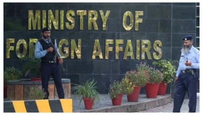 Two guards stand outside Foreign Office. — AFP