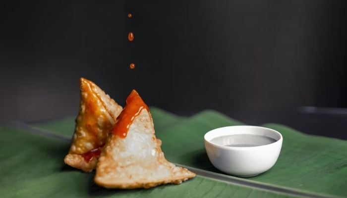 A 40-year-old drunk man was killed after he reportedly entered a shop and ate a samosa without the shop owners permission. — Unsplash/shreyaksingh