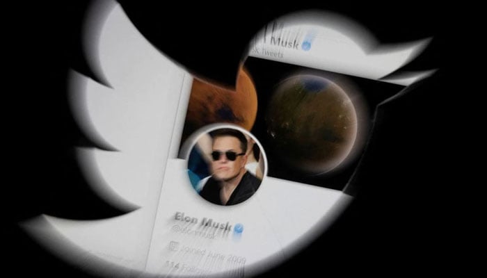 Elon Musks twitter account is seen through the Twitter logo in this illustration taken, April 25, 2022. — Reuters