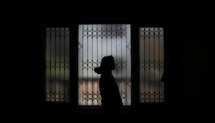 The picture shows the silhouette of a girl. — Reuters/File