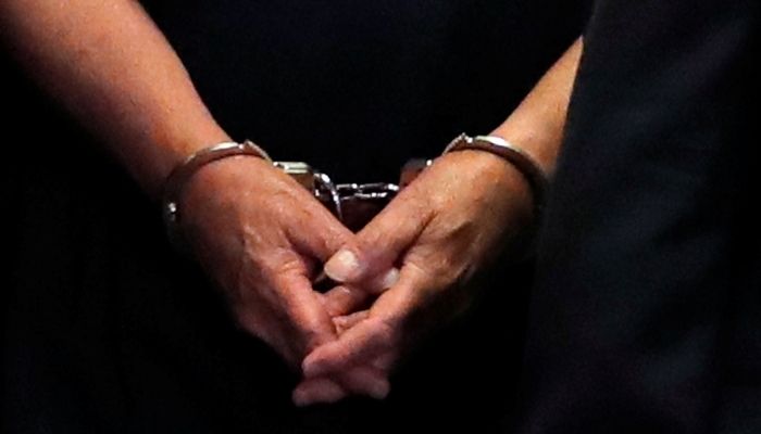 Former Trump campaign chairman Paul Manaforts hands are shown in handcuffs as he is escorted into court during before his arraignment in New York Supreme Court in New York, U.S., June 27, 2019. — Reuters